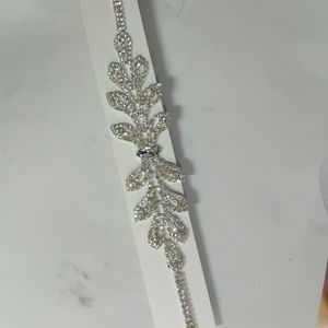 Rhinestone headband on black elastic